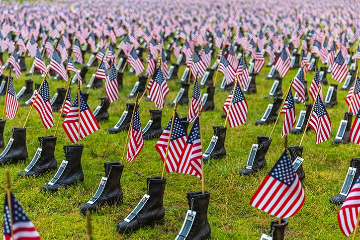 Military boots with American flags placed in them