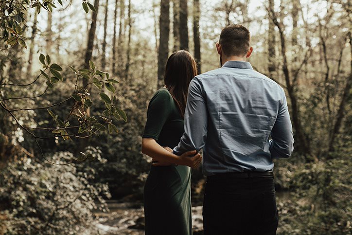 couple taking a walk in the forest