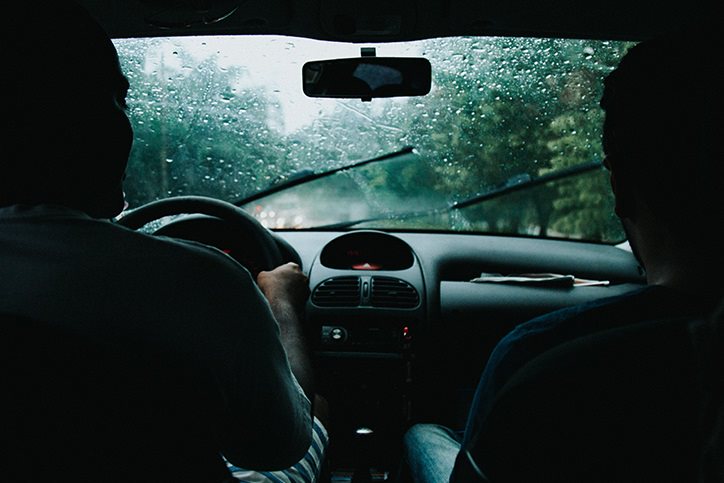 person driving in the rain