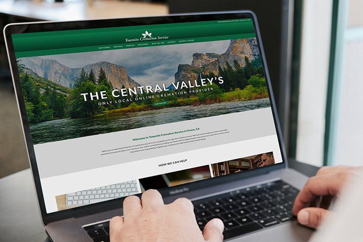 Close up of Yosemite Cremation Service website on a laptop