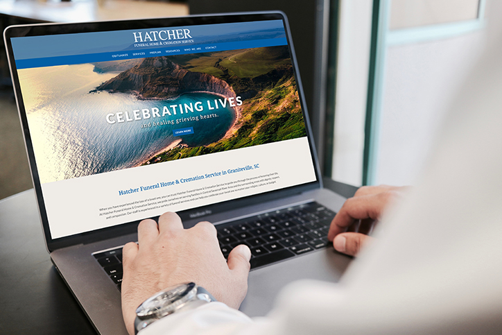 Hatcher Funeral Home website on a laptop