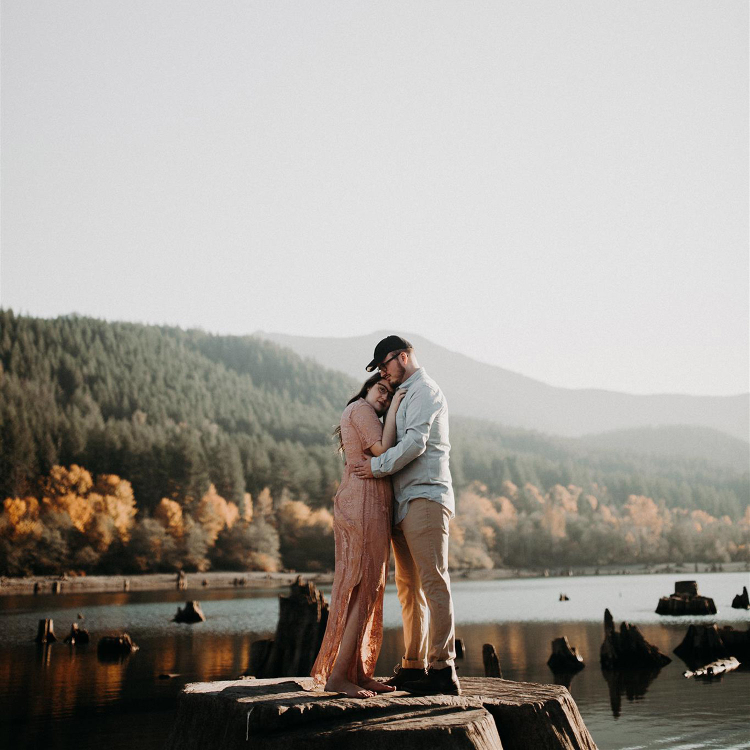 Two people hugging outside