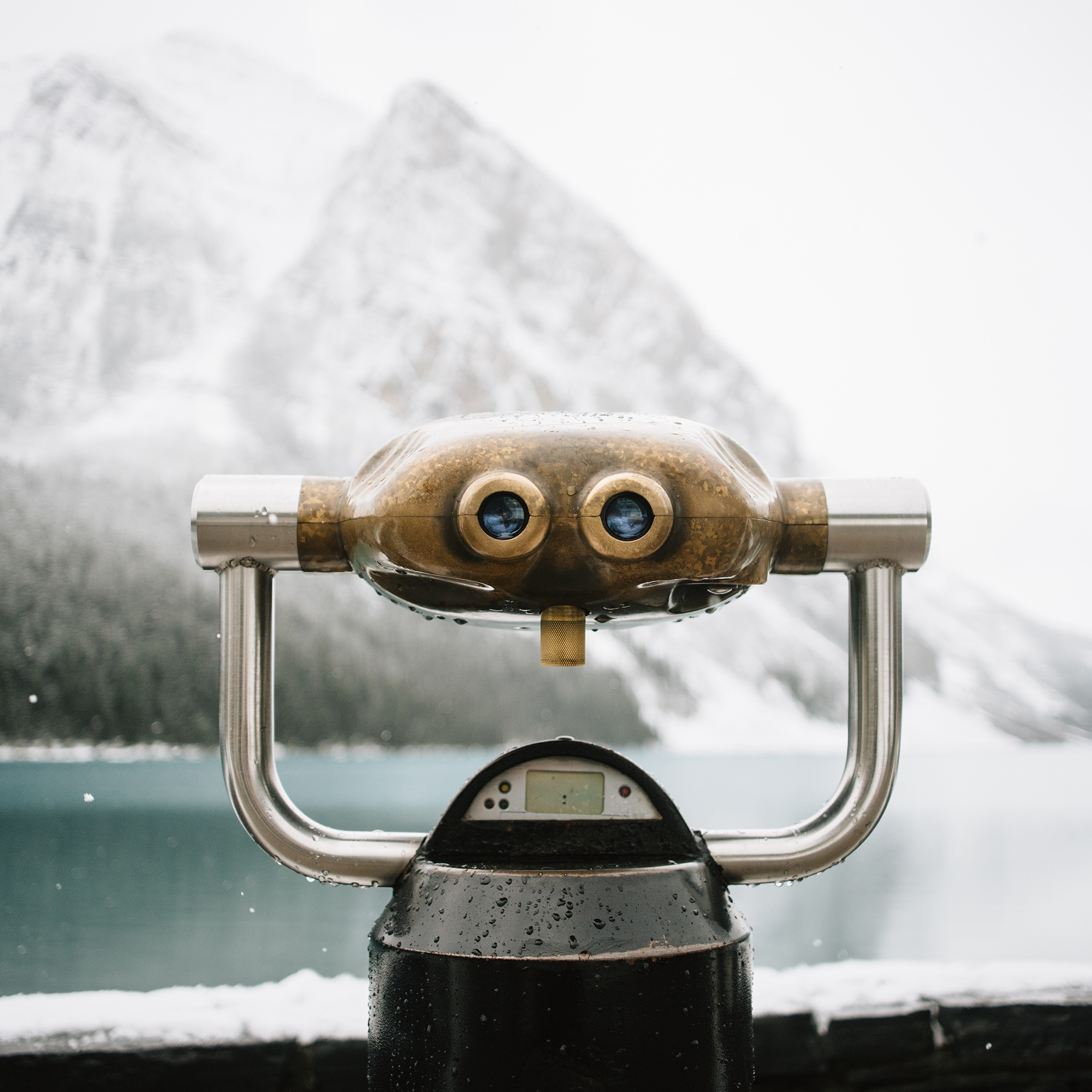 binoculars aimed at a mountain